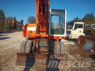 Atlas 1604 Gravemaskiner på hjul