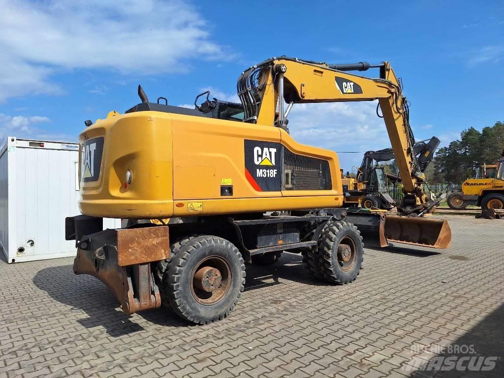 CAT M 318 F Gravemaskiner på hjul