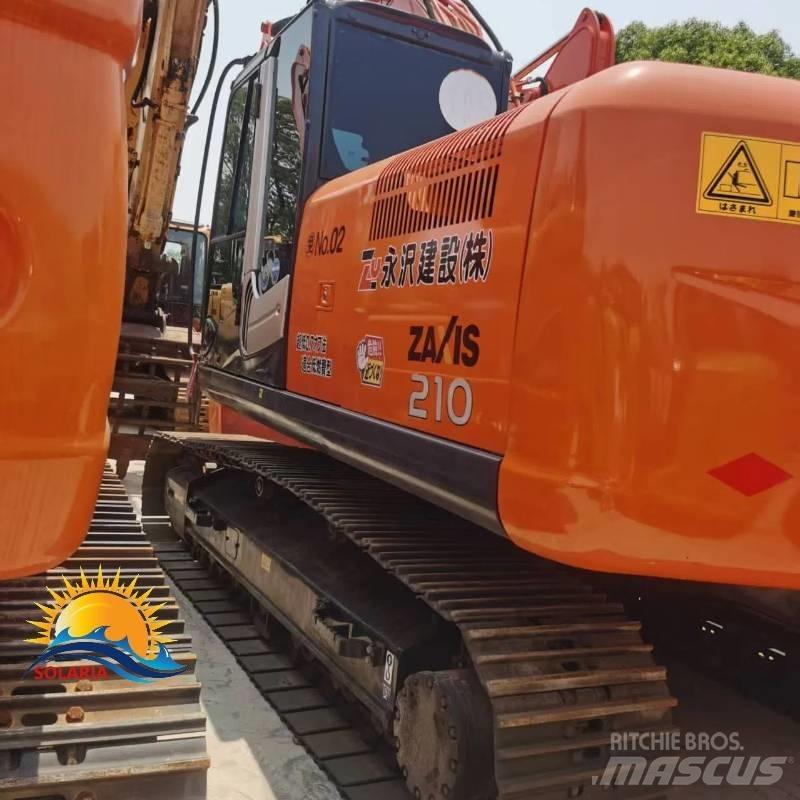 Hitachi ZX 210 Gravemaskiner på larvebånd