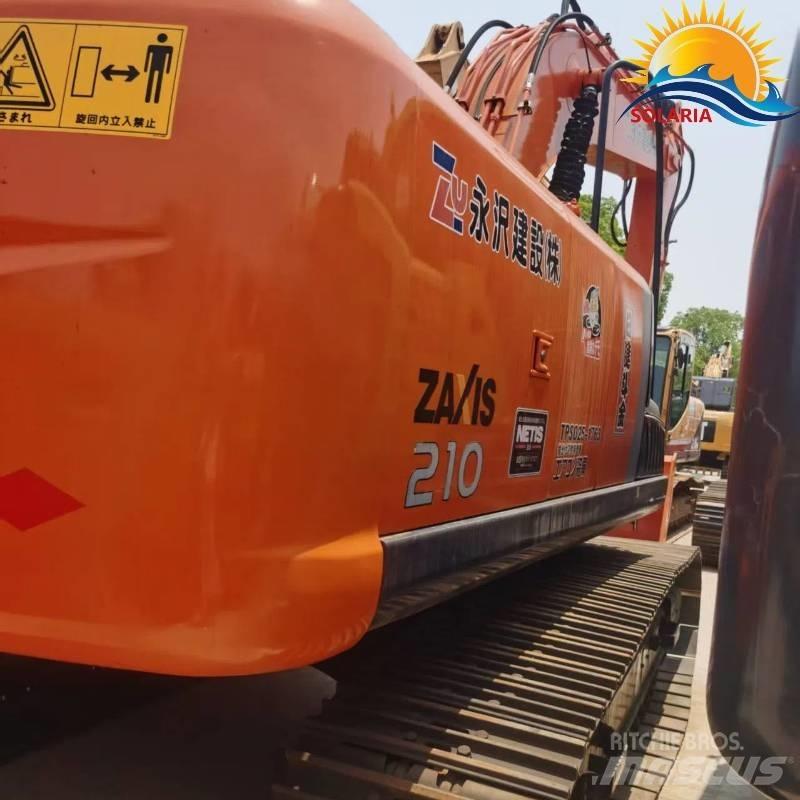 Hitachi ZX 210 Gravemaskiner på larvebånd