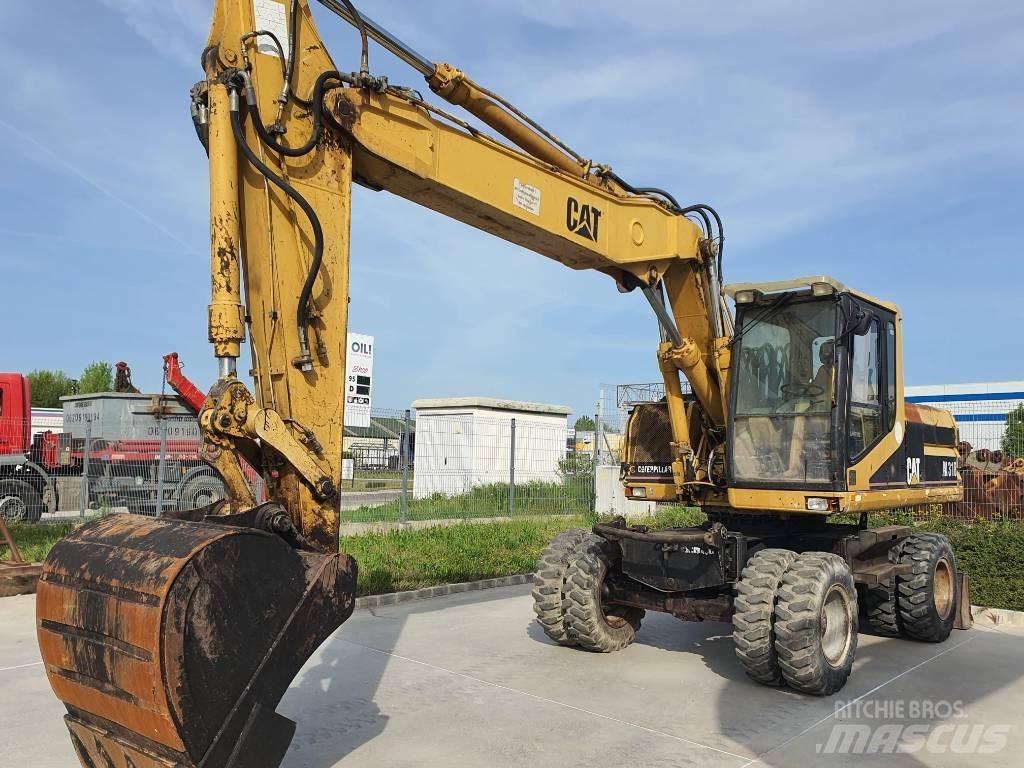 CAT M 318 Gravemaskiner på hjul