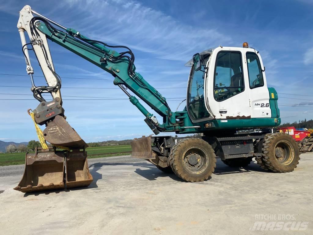 New Holland MH 2.6 Gravemaskiner på hjul