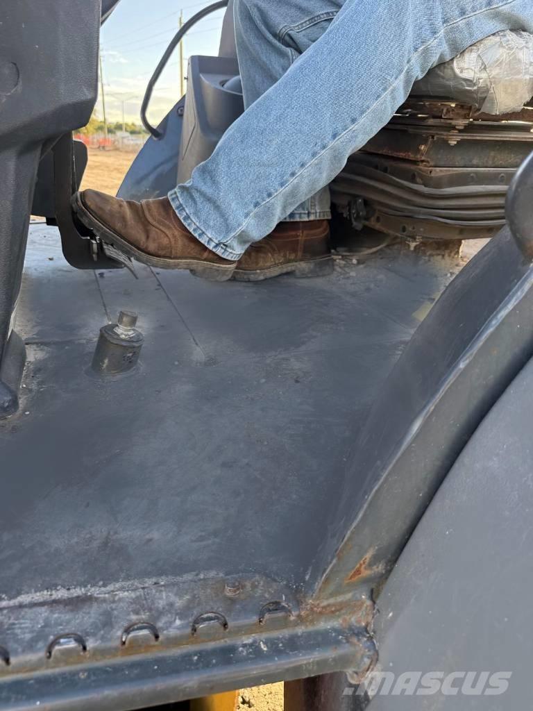 John Deere 310 L EP Rendegravere