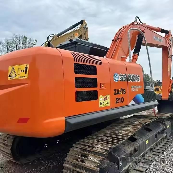 Hitachi ZX210 Gravemaskiner på larvebånd