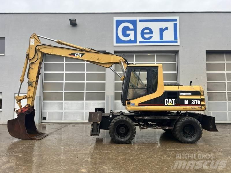 CAT M 315 Gravemaskiner på hjul