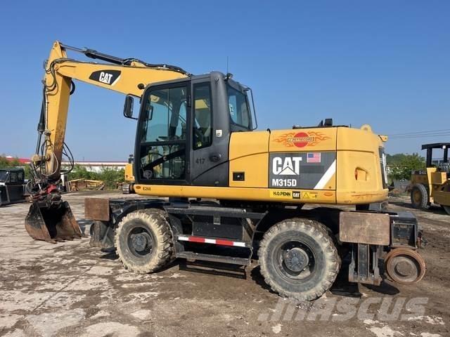 CAT M315D Gravemaskiner på hjul