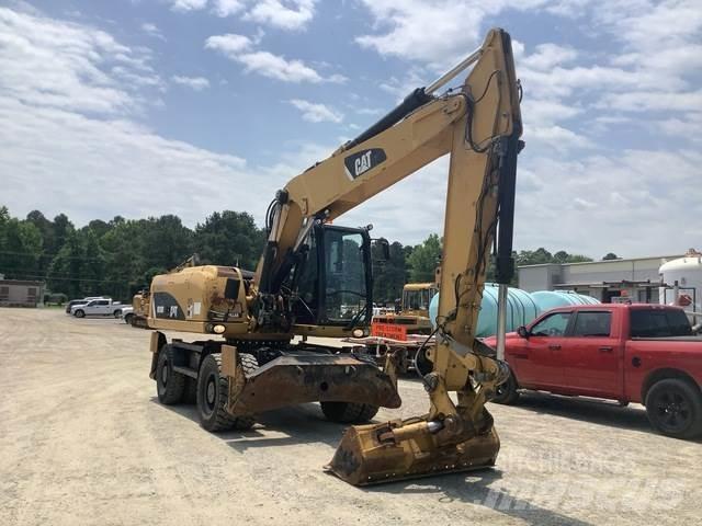 CAT M318D Gravemaskiner på hjul