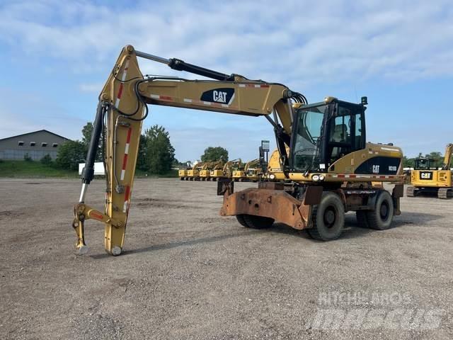CAT M318D Gravemaskiner på hjul