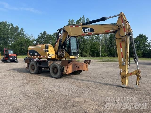 CAT M318D Gravemaskiner på hjul