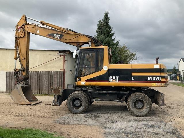 CAT M320 Gravemaskiner på hjul