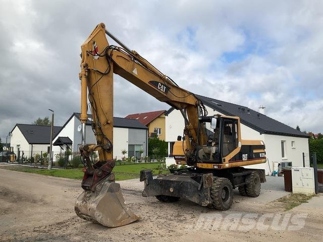 CAT M320 Gravemaskiner på hjul