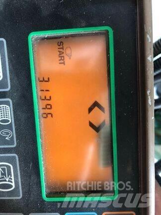 John Deere 590 Rundballe-pressere