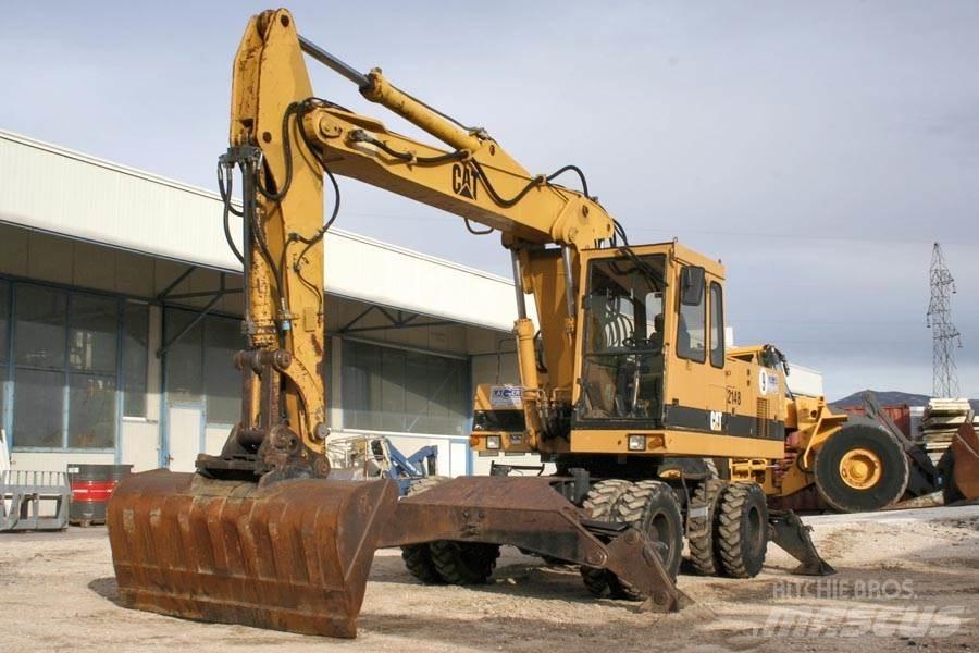 CAT 214B Gravemaskiner på hjul