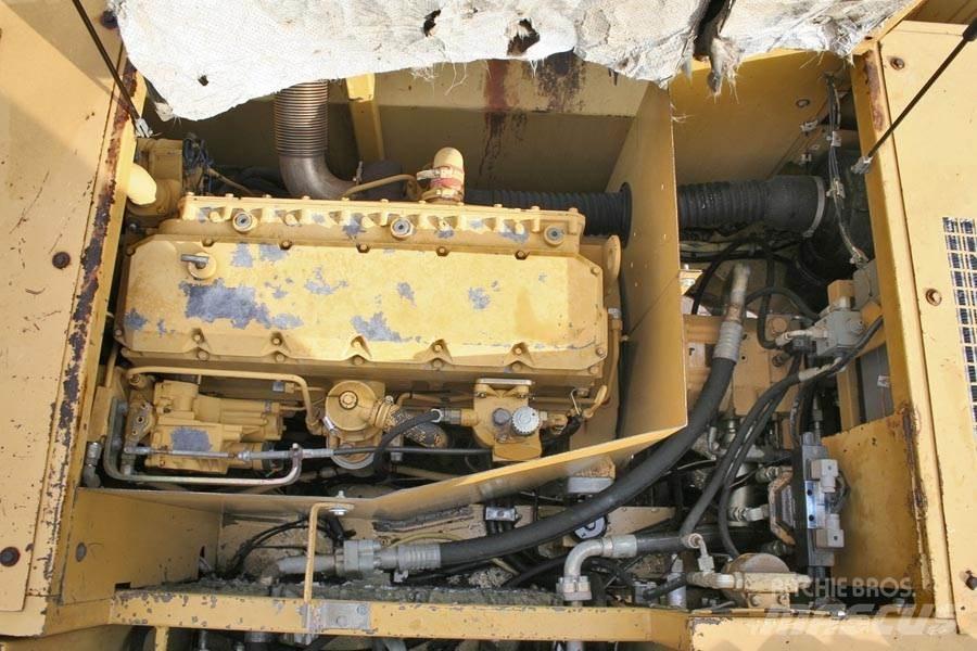 CAT 214B Gravemaskiner på hjul