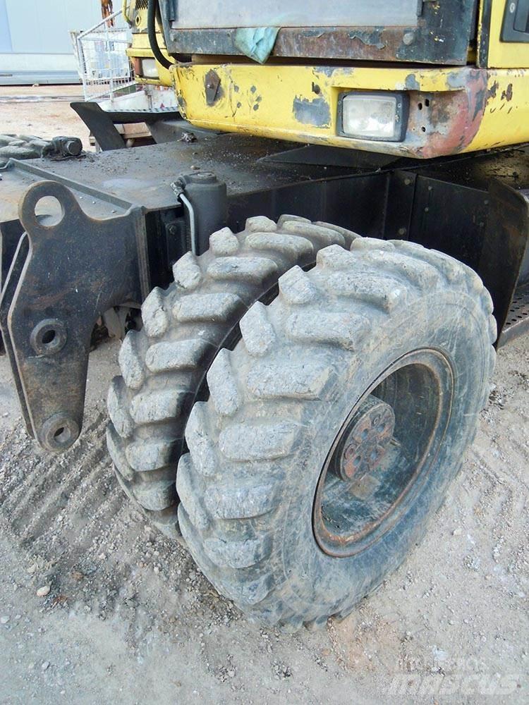 CAT M312 Gravemaskiner på hjul
