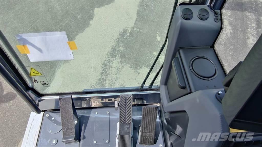 Fuchs MHL 320 Gravemaskiner på hjul