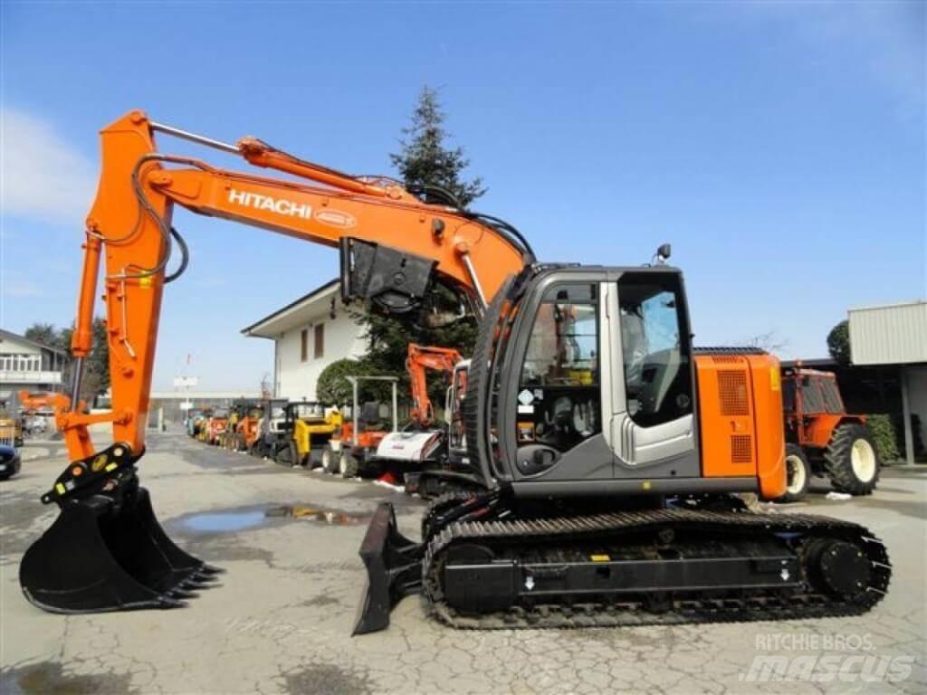 Hitachi ZX135 US-6 Gravemaskiner til skovbrug