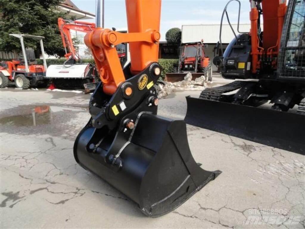 Hitachi ZX135 US-6 Gravemaskiner til skovbrug