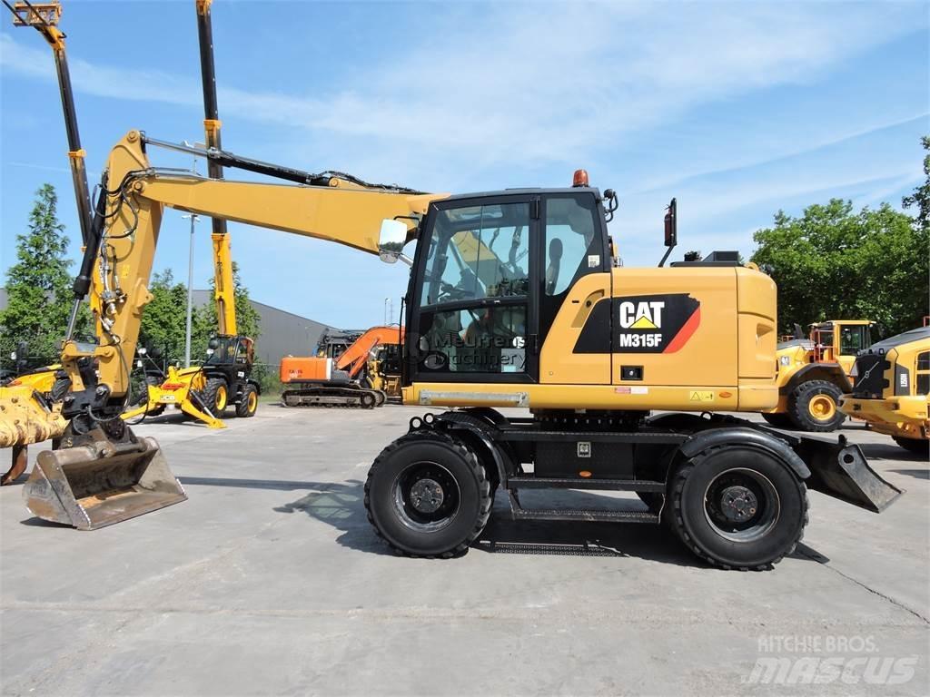 CAT M315 Gravemaskiner på hjul