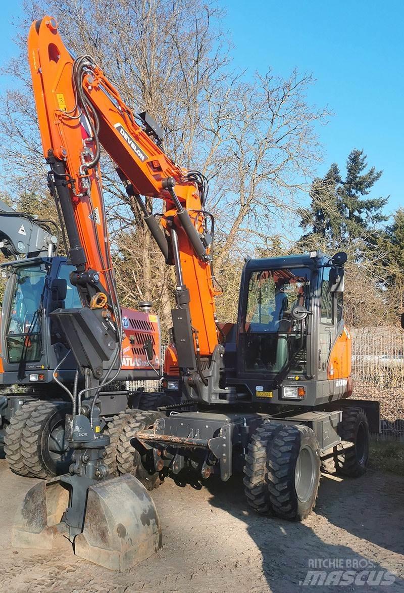 Develon DX 100 W-7 Gravemaskiner på hjul