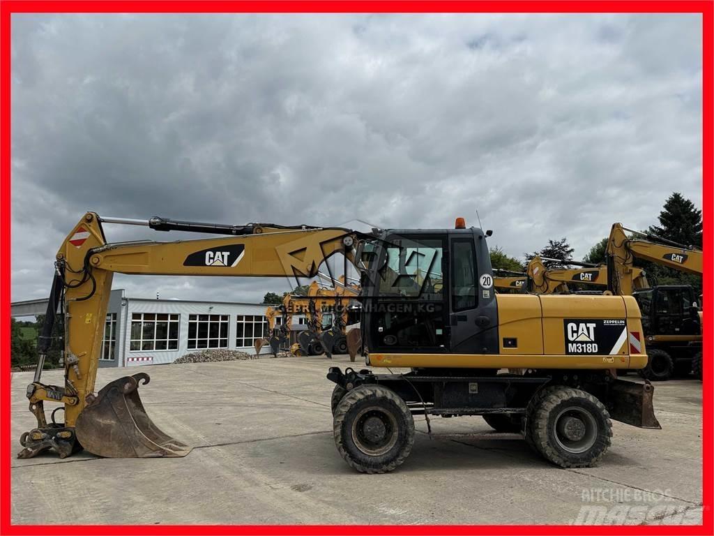 CAT M 318 D Gravemaskiner på hjul