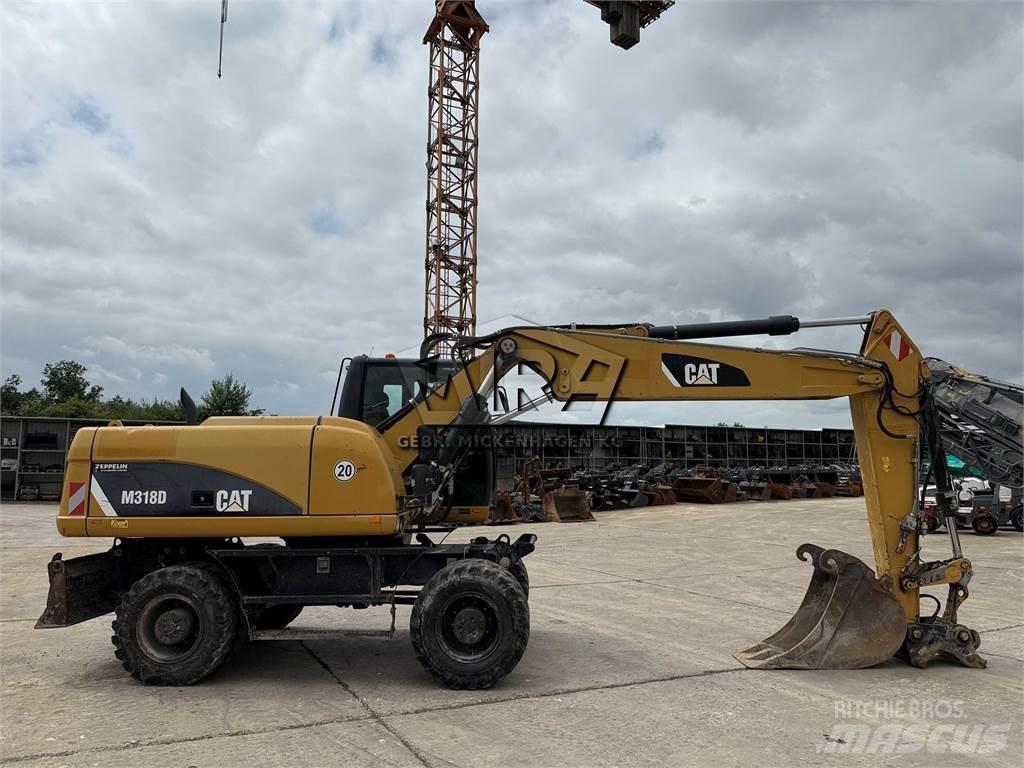 CAT M 318 D Gravemaskiner på hjul