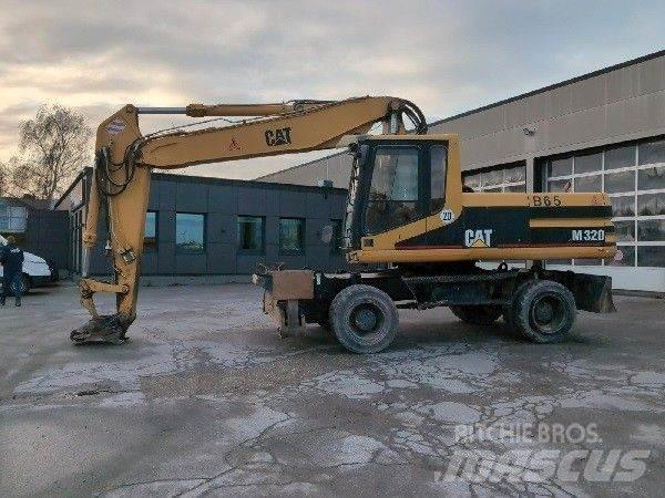 CAT M320 Gravemaskiner på hjul