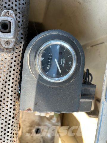 Fuchs 713 Gravemaskiner på hjul