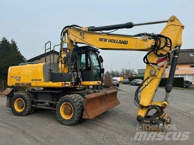 New Holland WE210 Gravemaskiner på hjul