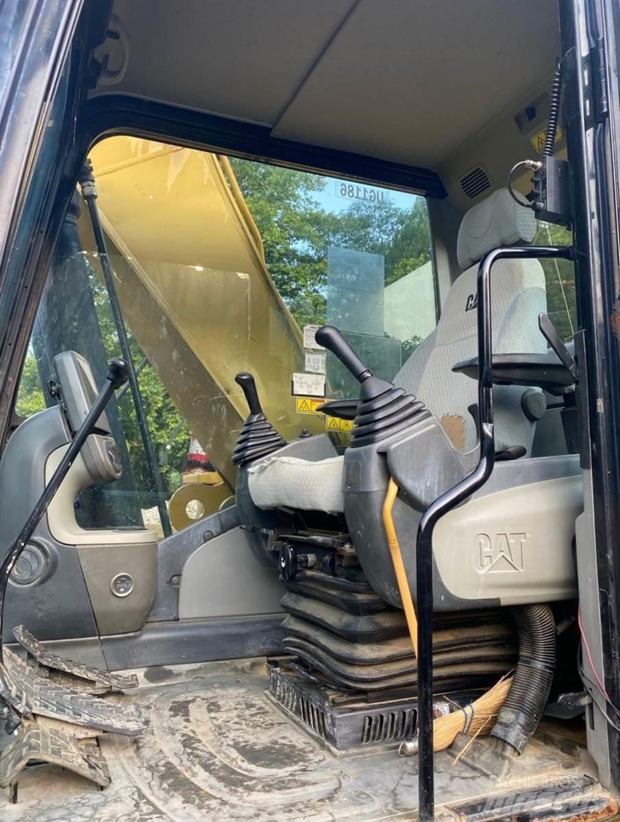 CAT 324DL Gravemaskiner med lang gravebom