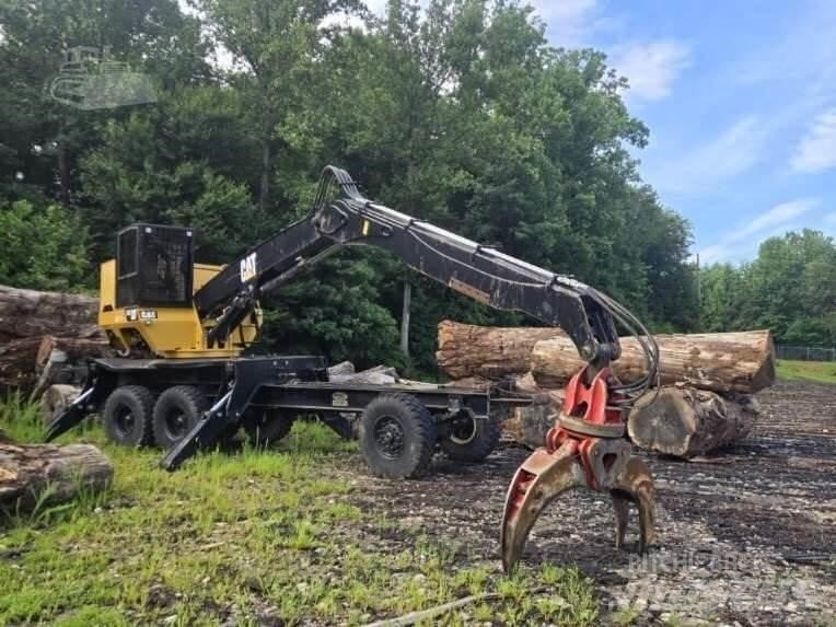 CAT 559C Knuckleboom læssere