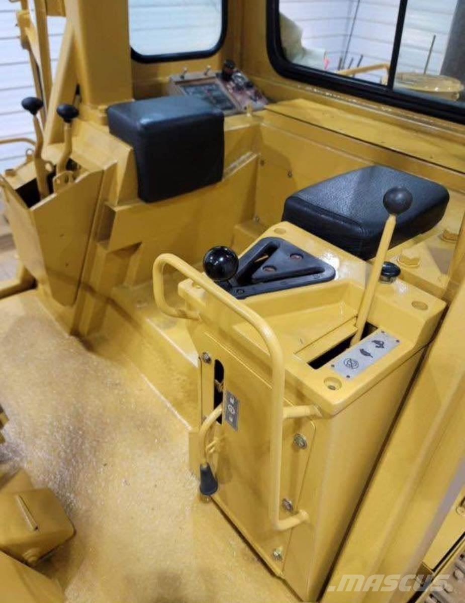 CAT 943 Larvebåndslæssere