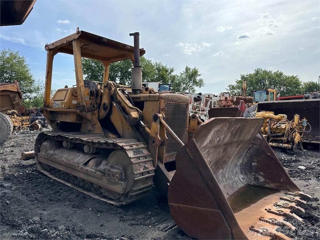 CAT 977 Larvebåndslæssere