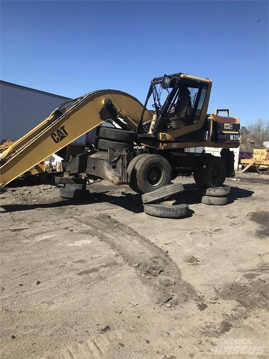 CAT M318 Gravemaskiner på hjul