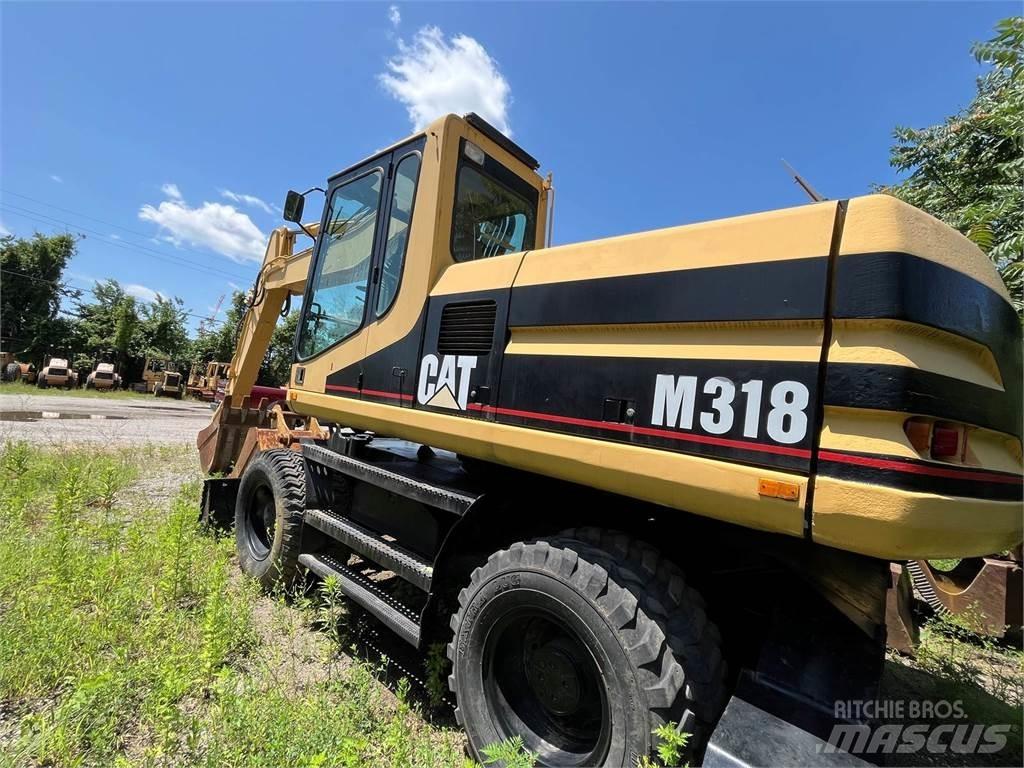 CAT M318 Gravemaskiner på hjul