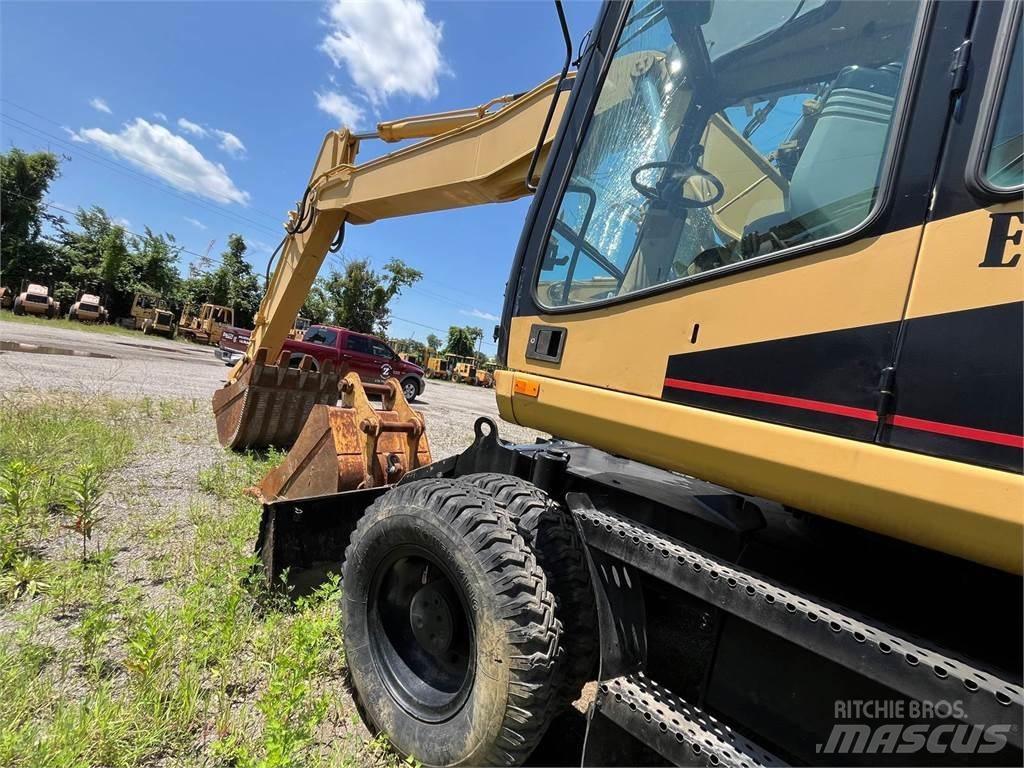 CAT M318 Gravemaskiner på hjul