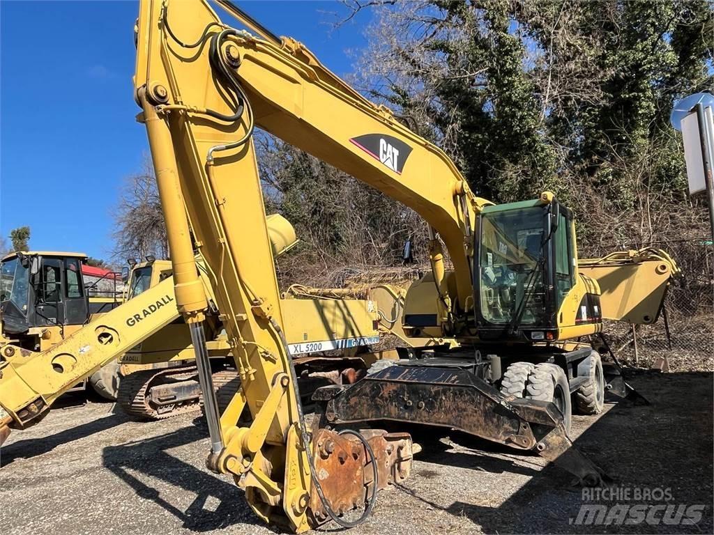 CAT M318C Gravemaskiner på hjul