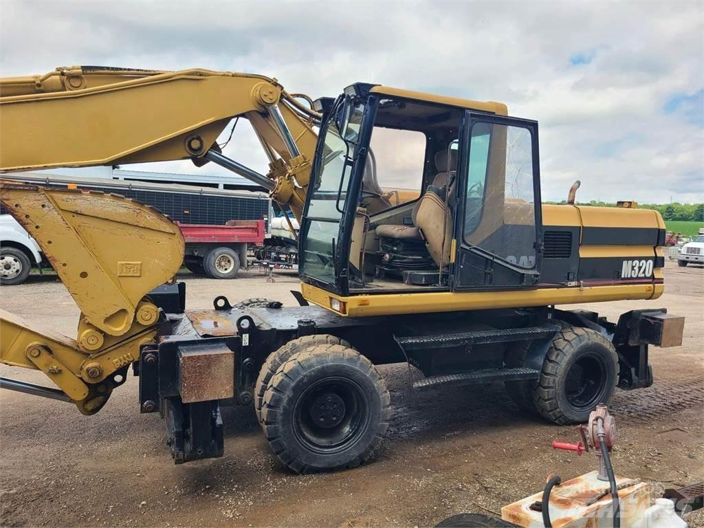 CAT M320 Gravemaskiner på hjul