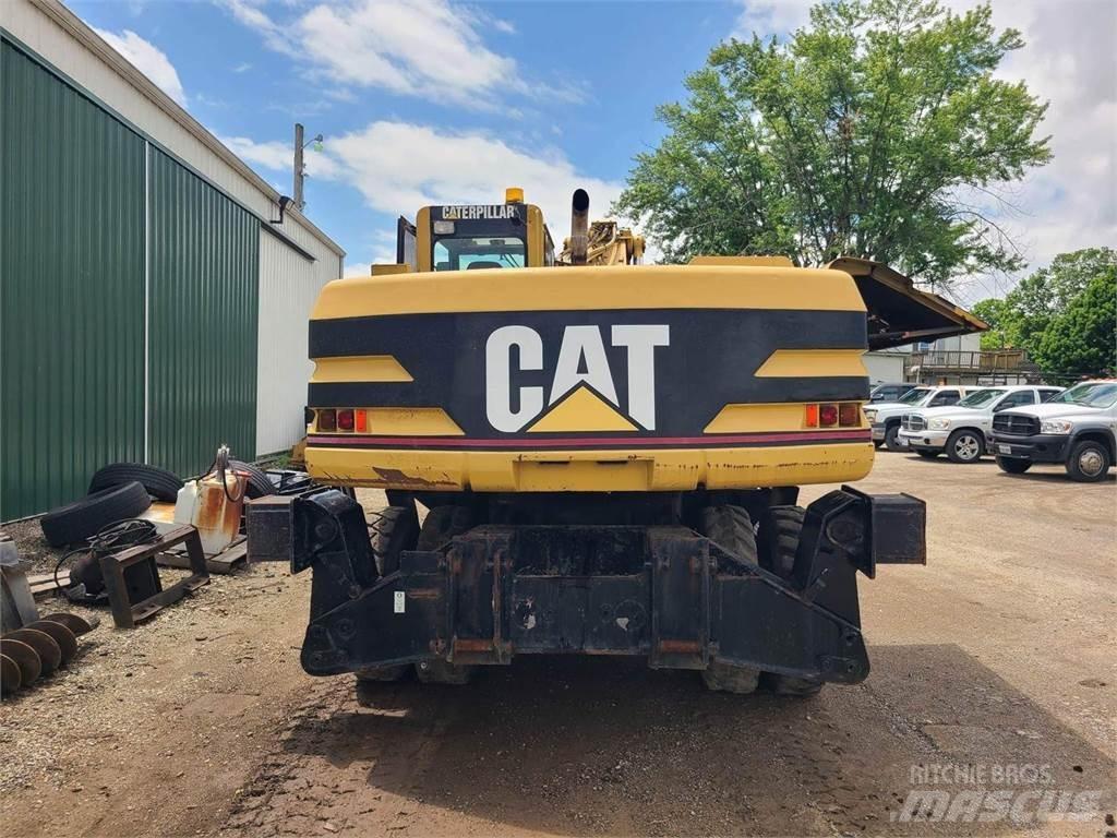 CAT M320 Gravemaskiner på hjul