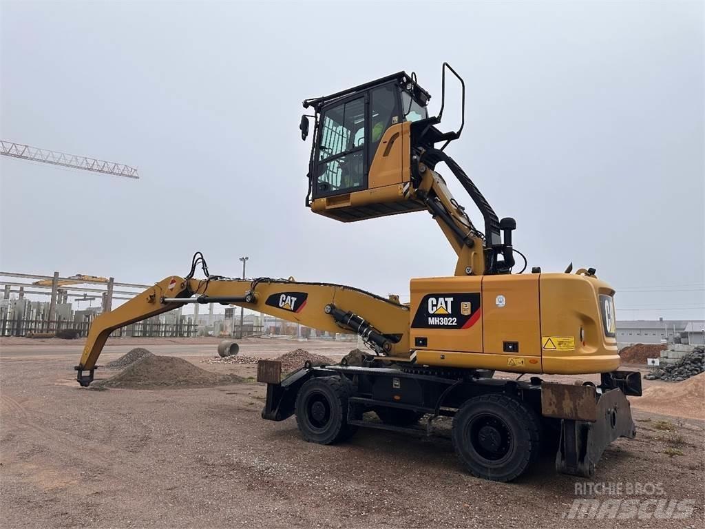 CAT MH3022 Gravemaskiner på hjul