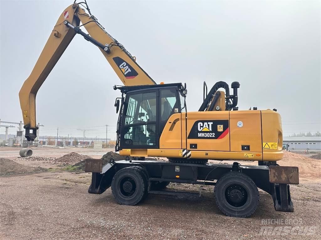 CAT MH3022 Gravemaskiner på hjul