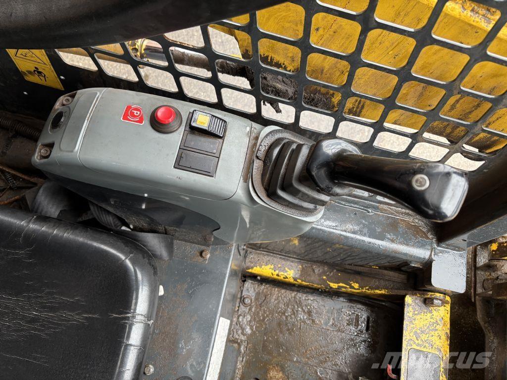 Komatsu SK510 Minilæsser - skridstyret