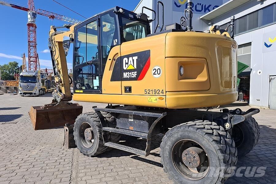 CAT M 315 F Gravemaskiner på hjul
