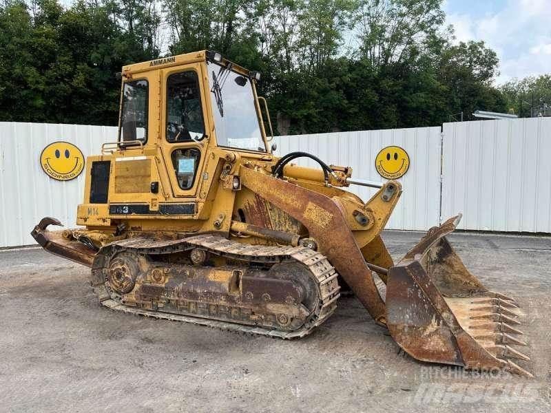 CAT 943 Larvebåndslæssere