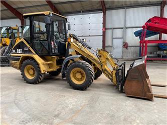 Caterpillar 906 læssemaskine