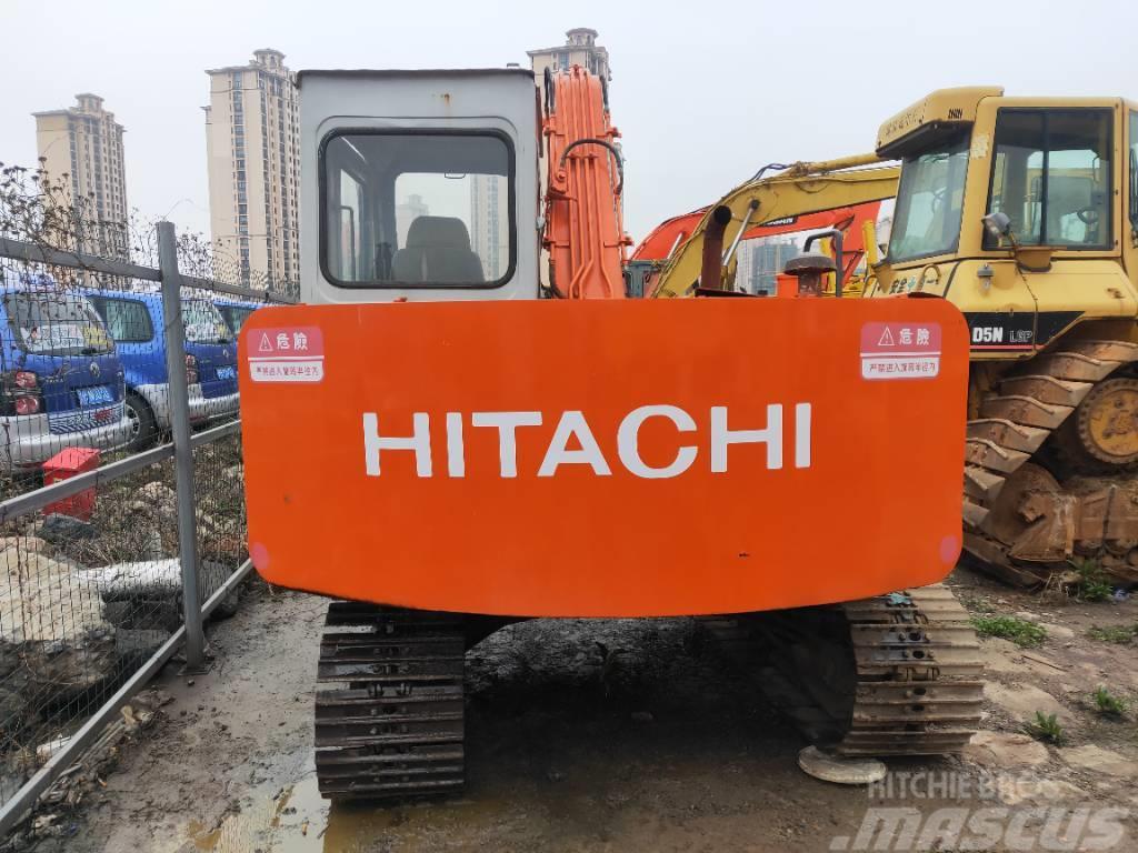 Hitachi EX 60 Gravemaskiner på larvebånd