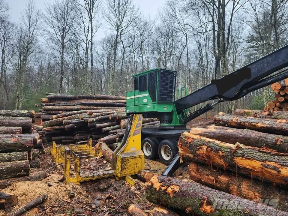 John Deere 437D Knuckleboom læssere