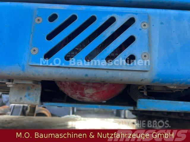 Fuchs MHL 331 / ZSA / AC / Hochfahrbare Kabine /Magnet Gravemaskiner på hjul